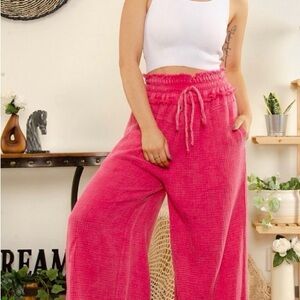 Vibrant Fuchsia Wide-Leg Pants. Smocked elastic waist w/tie. Pockets & raw hem.
